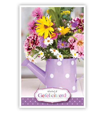 Bloemen in paarse gieter Bloemen in paarse gieter