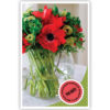 Rode bloemen in glazen vaas Rode bloemen in glazen vaas