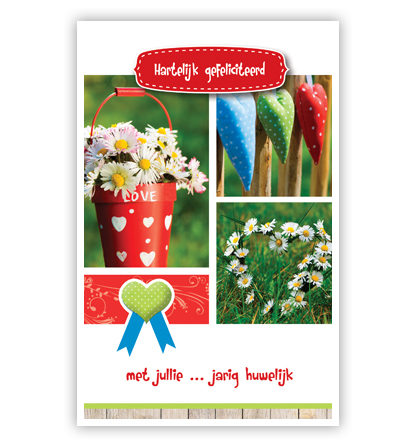 Rode emmer met margrietjes en hartjes Rode emmer met margrietjes en hartjes