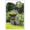 Tuin met stoel en 2 gieters Tuin met stoel en 2 gieters