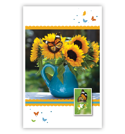Zonnebloemen in blauwe kan
