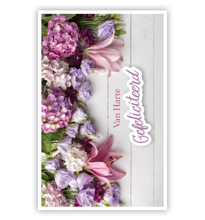 Paarse en roze bloemen op hout Paarse en roze bloemen op hout