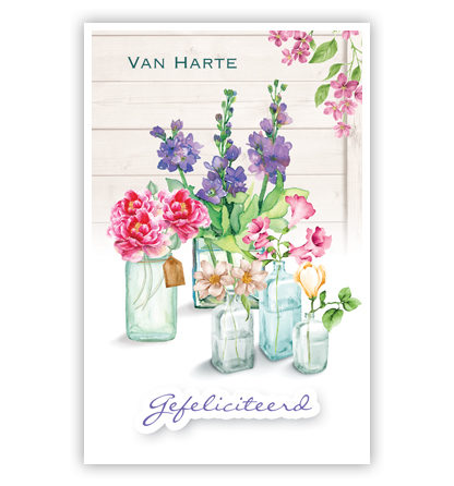 Bloemen in glazen vaasjes Bloemen in glazen vaasjes