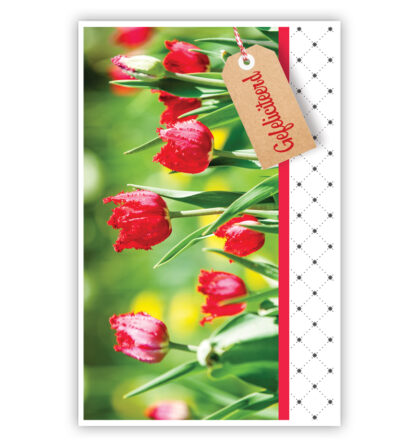 Rode bloemen en kaartje met tekst Rode bloemen en kaartje met tekst